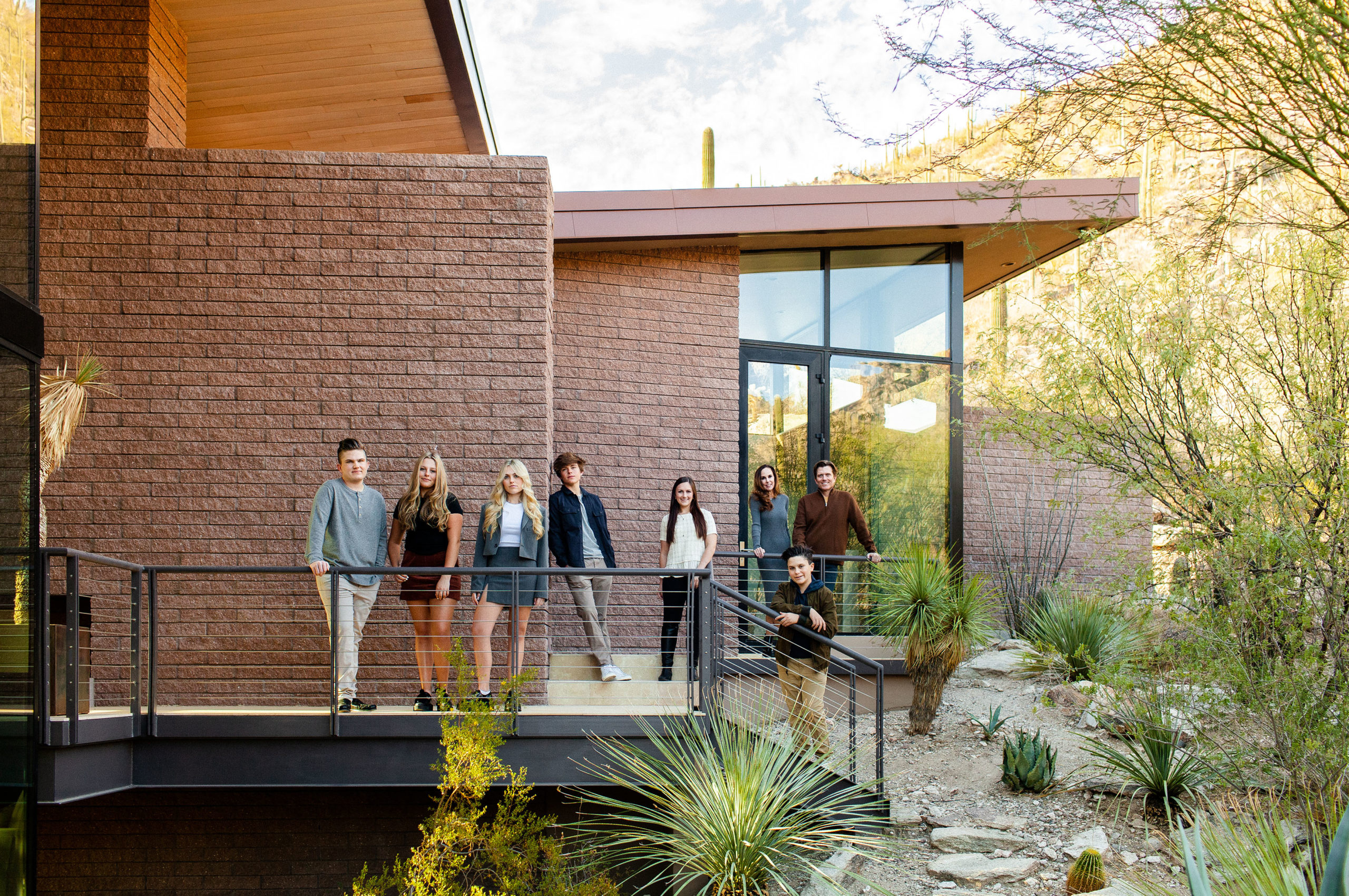 Modern family session at their custom built home in Tucson Arizona with six children.