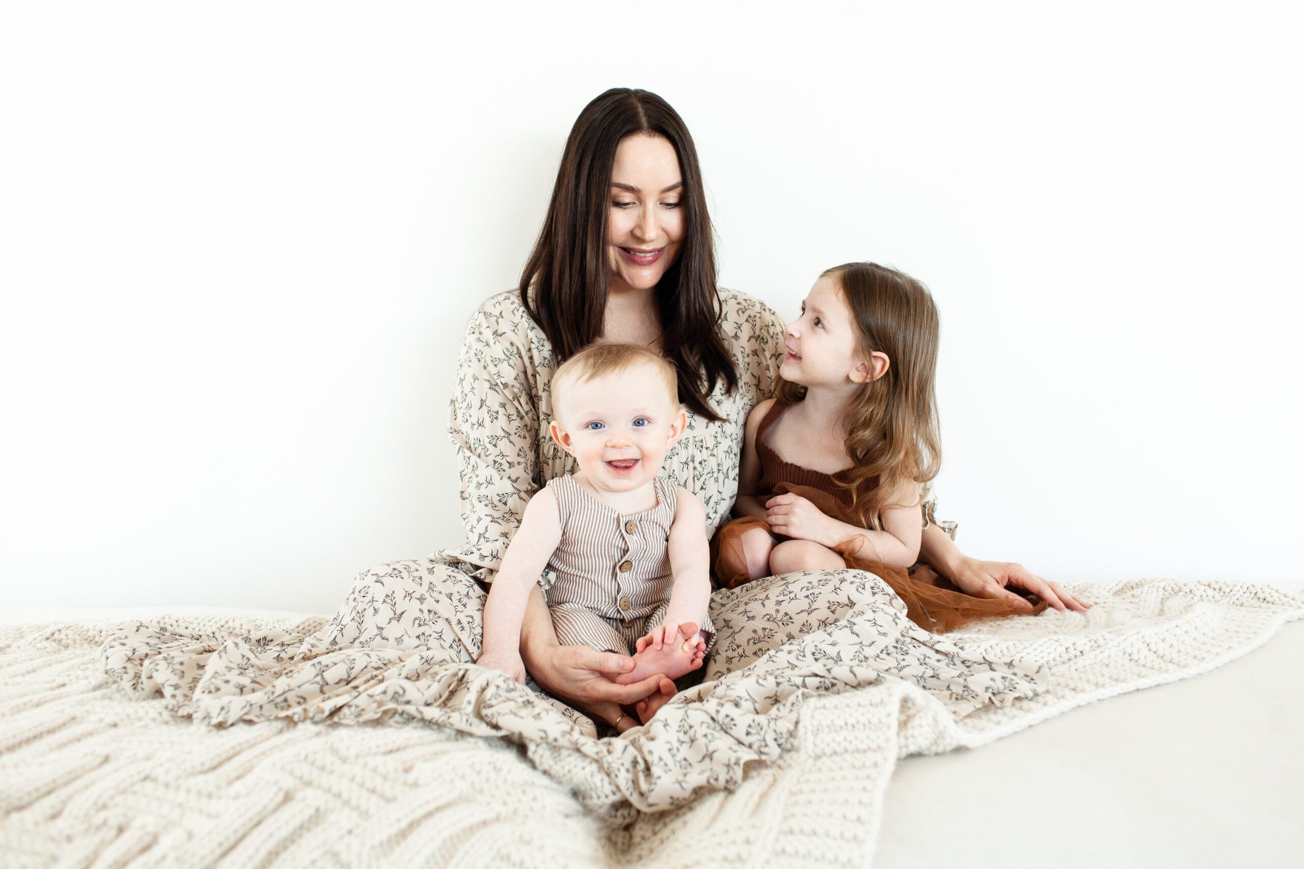Studio motherhood portraits with baby boy and toddler daughter