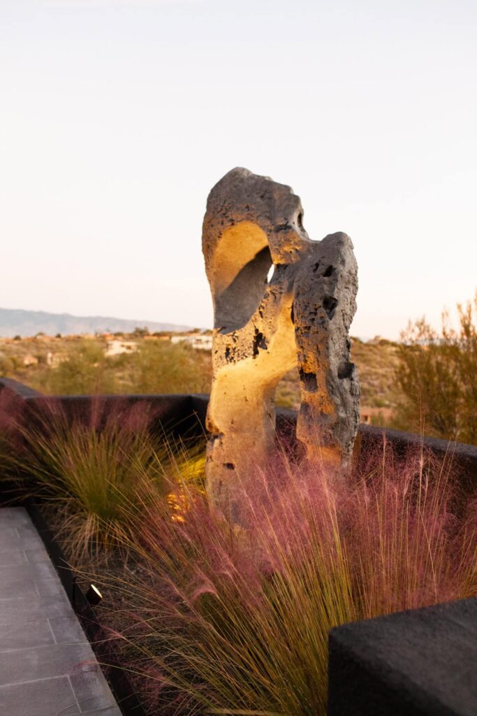Oversized cast-stone sculpture anchoring a mid-century Tucson landscape, photographed by Fletcher and Co for Box Hill Landscape Design.